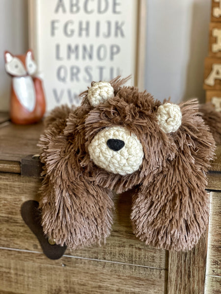 A plush brown bear lovey made by ClaraLoo with soft faux fur and a crochet muzzle and ears.